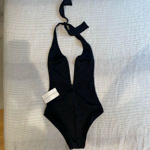 Solid and striped one piece low plunge bikini